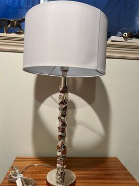 Modern Sculpted Silver Table Lamp with White Drum Shade